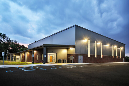 Modern commercial facility with controlled access entrance